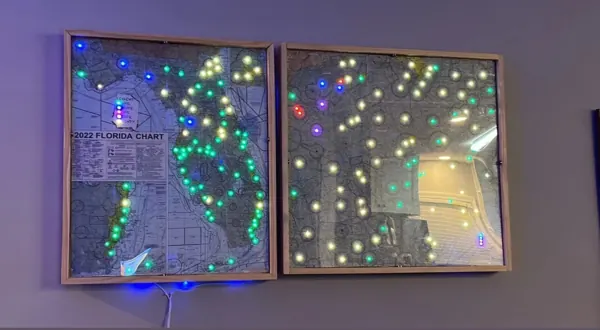 Two framed map panels hung side by side