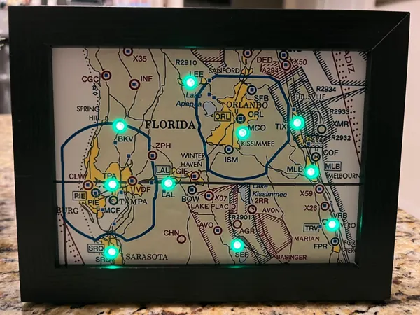 A framed central Florida sectional with green lights at Tampa, Orlando and nearby airports