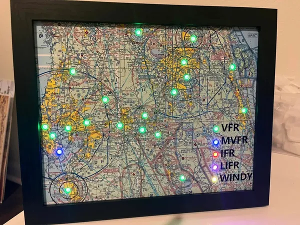 Photo 3: A finished map with green, blue and red airport lights and a lit legend for VFR, MVFR, IFR, LIFR and Windy