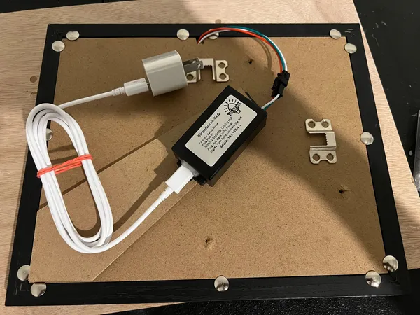 Photo 4: The back of a fully assembled map with the hub and power cable mounted inside the frame
