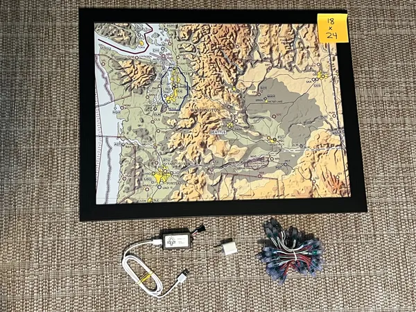 Photo 5: An 18x24 map kit: a framed sectional with the hub, wall plug and a bundle of lights